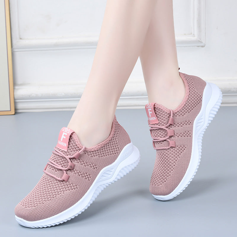 One pair of lightweight, breathable women's sports shoes suitable for vacations.