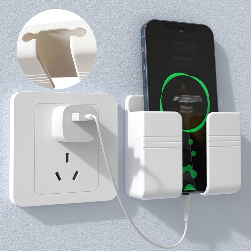 Wall-mounted phone charging holder and organizer for bedside and remote control storage.