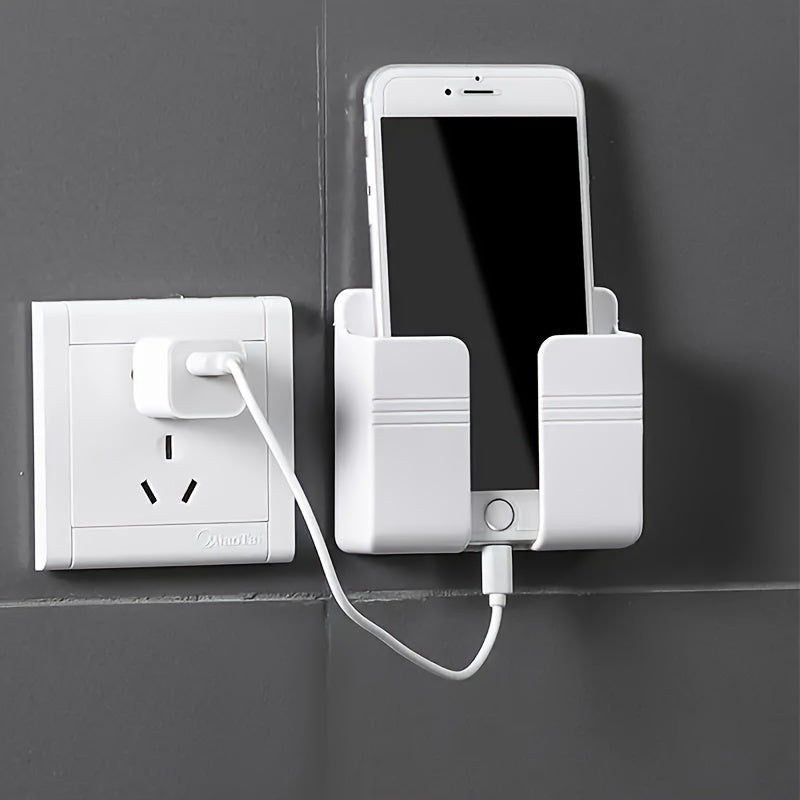 Wall-mounted phone charging holder and organizer for bedside and remote control storage.