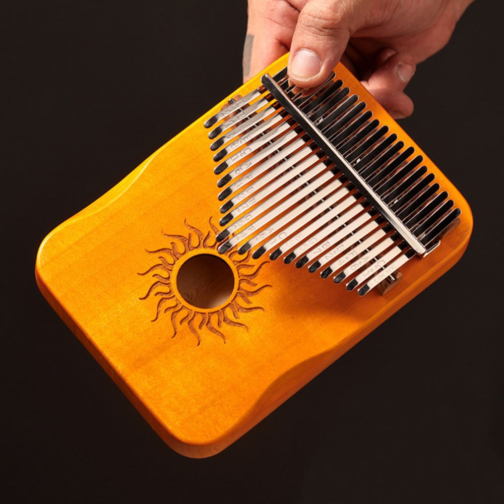 21-Key Kalimba Thumb Piano, made of solid wood, includes tuning hammer and accessories, perfect for beginners and gifting.