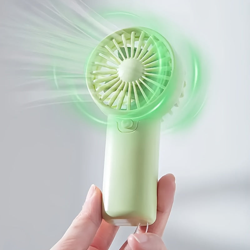 Portable Mini Fan - Lightweight and Battery-Powered Handheld Fan for Outdoor and Travel Use; AAA Batteries Sold Separately