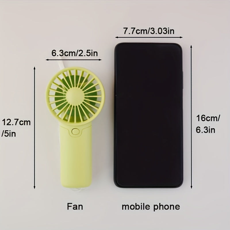 Portable Mini Fan - Lightweight and Battery-Powered Handheld Fan for Outdoor and Travel Use; AAA Batteries Sold Separately