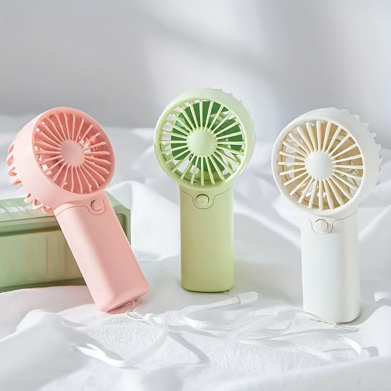 Portable Mini Fan - Lightweight and Battery-Powered Handheld Fan for Outdoor and Travel Use; AAA Batteries Sold Separately