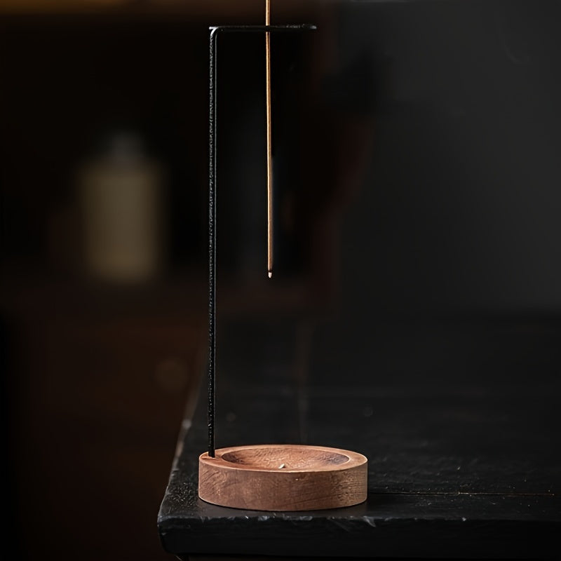 Zen-inspired wooden incense burner with ash catcher, perfect for meditation and home decor, made of metal.