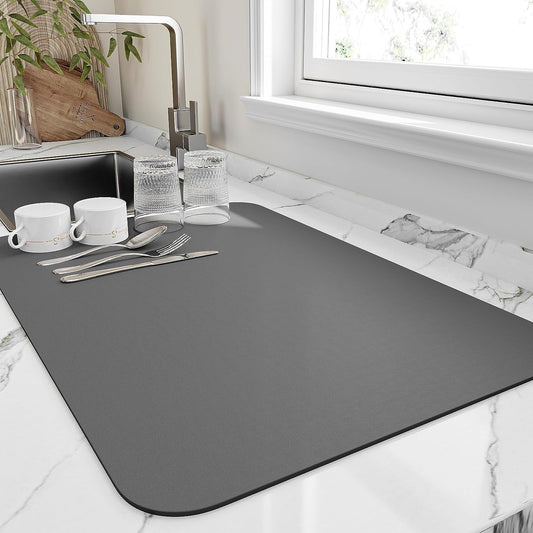 Highly absorbent kitchen drying mat with heat resistant, non-slip rubber backing - ideal for home and restaurant use.