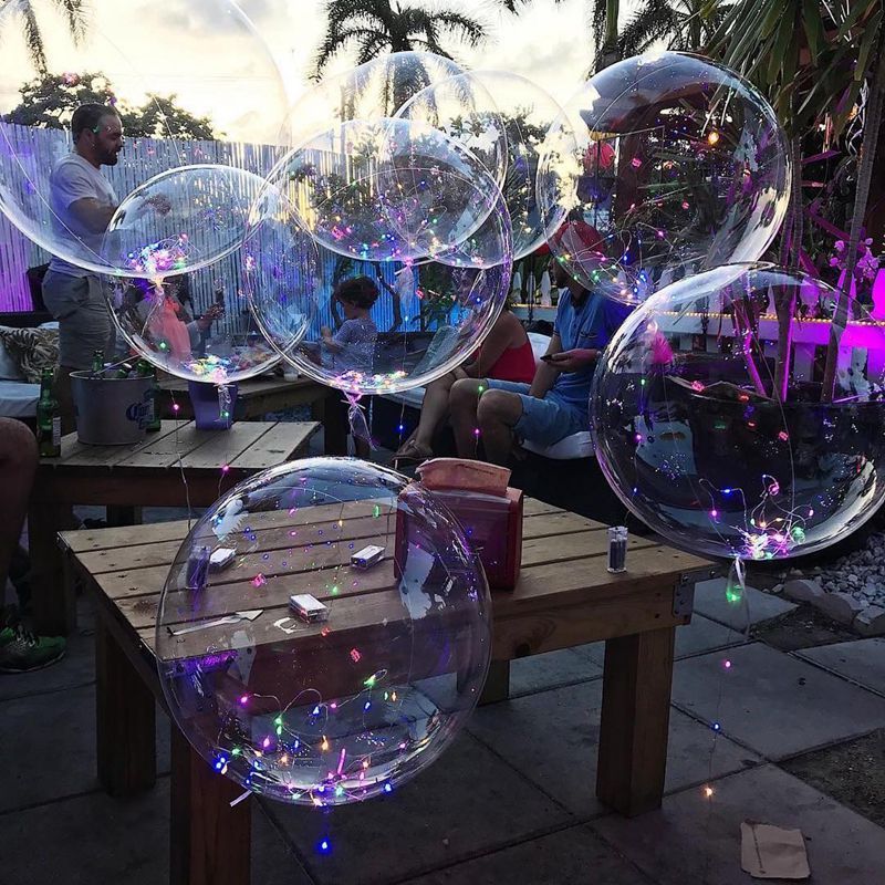 10 transparent bobo bubble balloons, 20 inches each, for events such as weddings, birthdays, showers, and holidays.