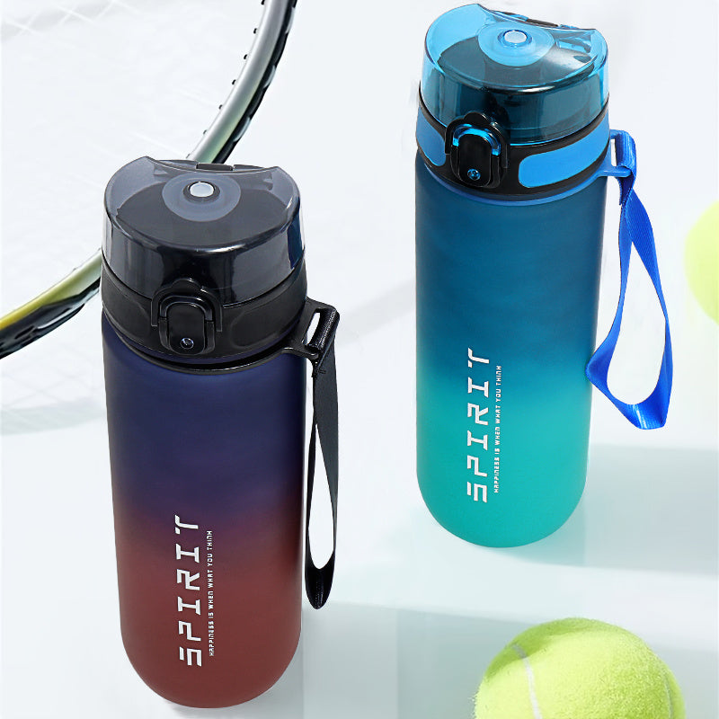 Gradient sports water bottle with strap, leak-proof, large capacity, portable, frosted, BPA-free plastic, flip top lid, ideal for fitness and students.