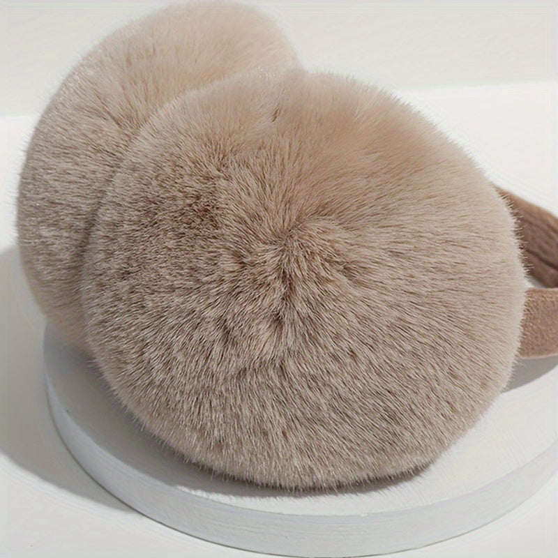 Warm and snug fleece earmuffs designed for women - featuring a stretchable, knitted design and plush lining to keep ears toasty during winter. Ideal for cycling and various outdoor activities.