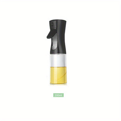 Plastic oil sprayer bottle with dual-function pour and spray, leak-proof olive oil dispenser.