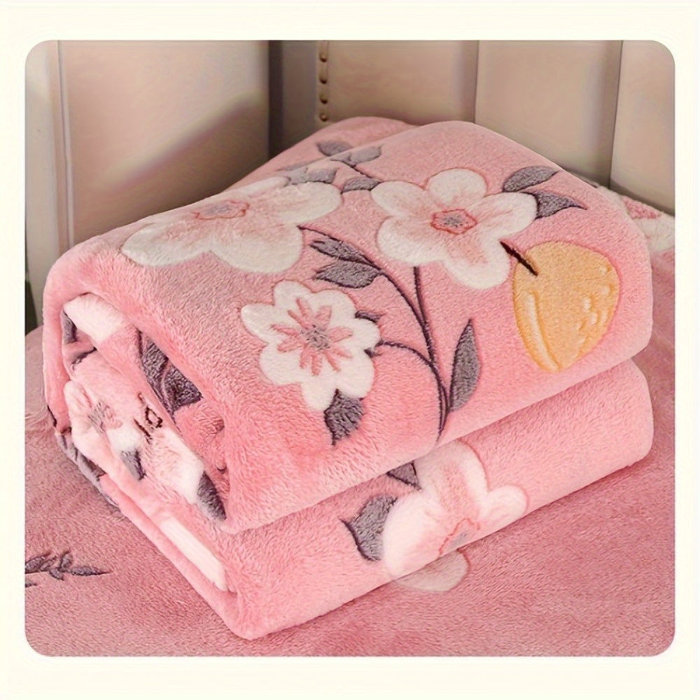 Soft and cozy pink floral print flannel blanket perfect for a variety of uses such as office, camping, travel, home decoration, naps, shawl, sofa, and as a holiday gift. The blanket is comfortable, skin-friendly, and multi-functional.