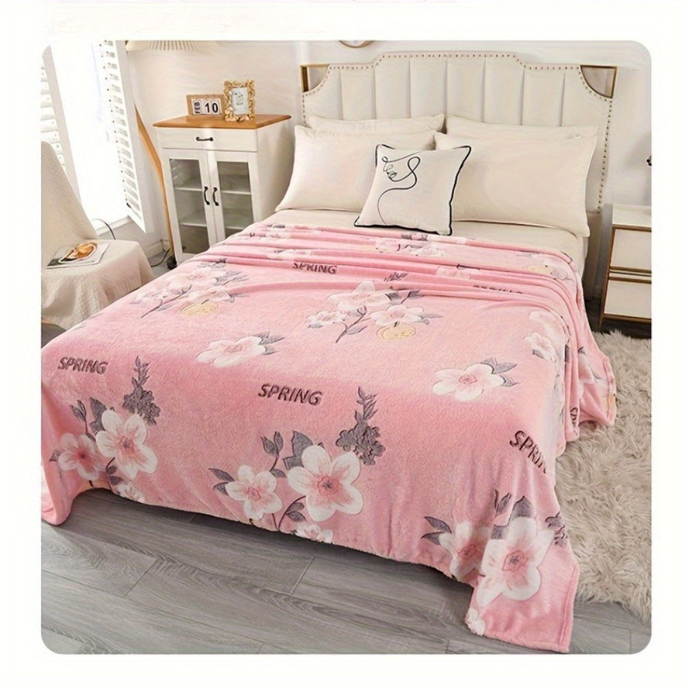 Soft and cozy pink floral print flannel blanket perfect for a variety of uses such as office, camping, travel, home decoration, naps, shawl, sofa, and as a holiday gift. The blanket is comfortable, skin-friendly, and multi-functional.