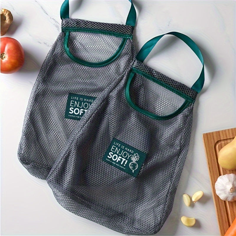 Mesh storage bag for kitchen, can be mounted on the wall, breathable design, great for storing fruits and vegetables. Can also be used as a reusable grocery bag. Perfect for organizing your kitchen or pantry without coming into contact with food.