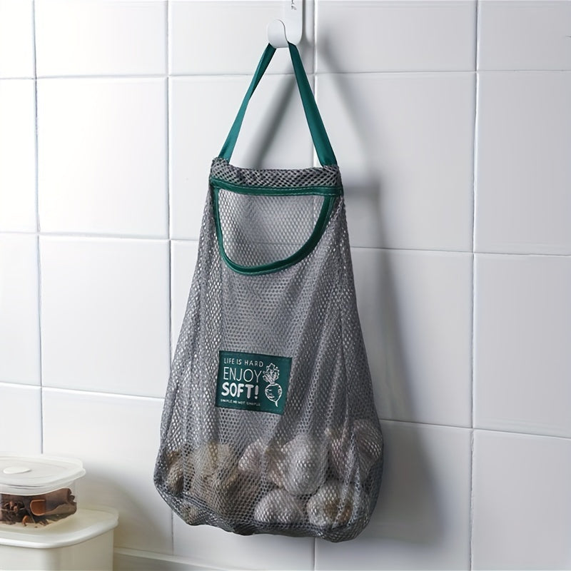 Mesh storage bag for kitchen, can be mounted on the wall, breathable design, great for storing fruits and vegetables. Can also be used as a reusable grocery bag. Perfect for organizing your kitchen or pantry without coming into contact with food.