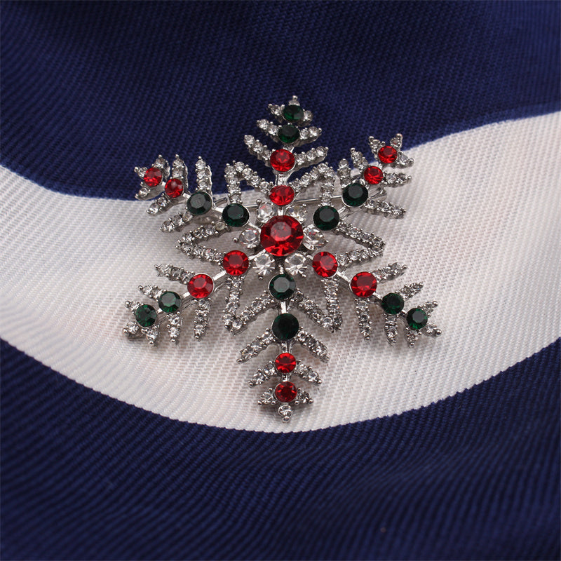 Upgrade your style with this exquisite Luxury Rhinestone Snowflake Brooch Pin. Perfect for adding a touch of elegance to your party attire or as a festive decoration for your clothing, bags, and hats. Elevate your personal style with its sparkling charm