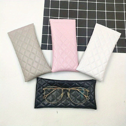 Portable squeeze glasses case made of faux leather designed to hold either 1, 2, 3, or 4 pieces. This soft fashion glasses bag also doubles as a portable phone storage box for fashion glasses.