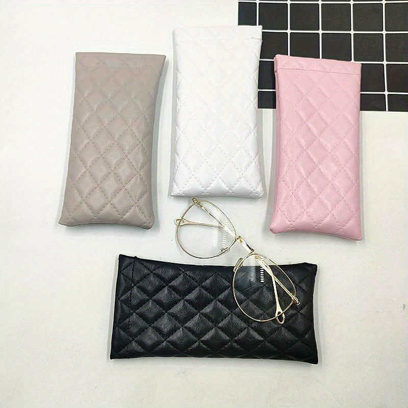 Portable squeeze glasses case made of faux leather designed to hold either 1, 2, 3, or 4 pieces. This soft fashion glasses bag also doubles as a portable phone storage box for fashion glasses.