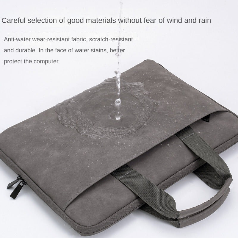 Spacious gray PU leather laptop bag fits 33.02-40.64 cm laptops with organized compartments for essentials.