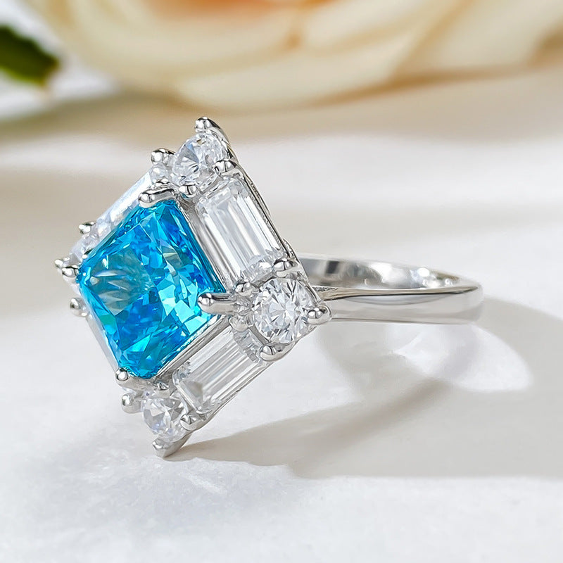 Upgrade your style with this stunning Boho Chic ring made of 925 Sterling Silver featuring a synthetic blue stone and baguette-cut accents. This no-plating ring boasts a fashionable square design, perfect for daily wear and music festivals. Versatile for