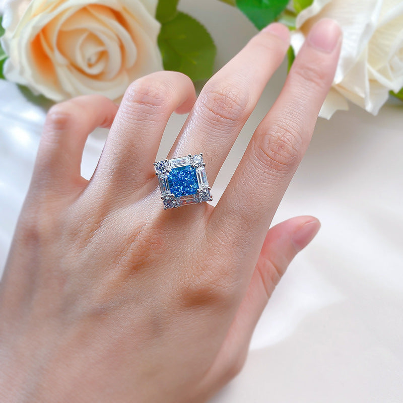 Upgrade your style with this stunning Boho Chic ring made of 925 Sterling Silver featuring a synthetic blue stone and baguette-cut accents. This no-plating ring boasts a fashionable square design, perfect for daily wear and music festivals. Versatile for