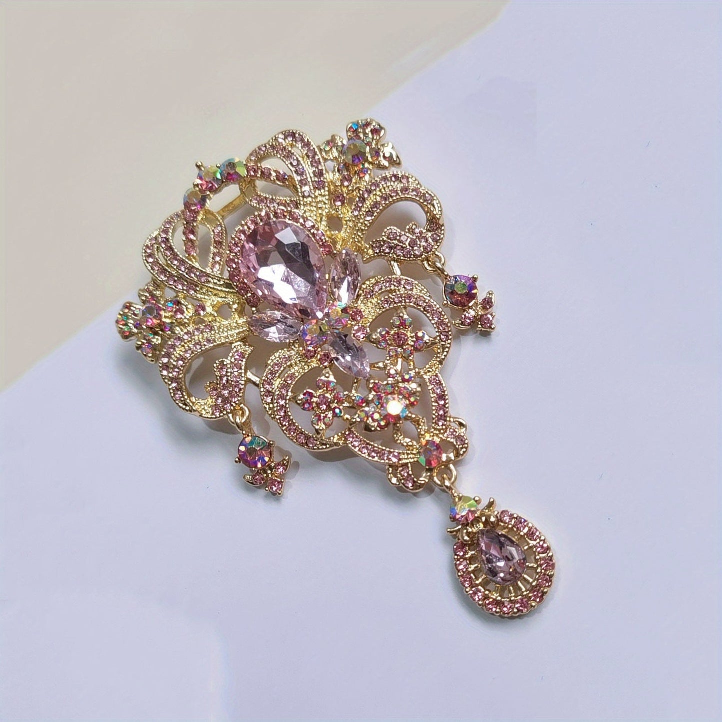 Stylish antique-inspired crystal flower brooch - shimmering rhinestone fashion accessory perfect for scarves, shawls, and clothing.