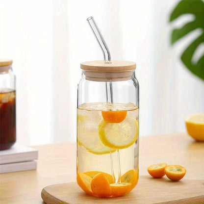 Glass water cup with straw for iced coffee, beer, and tea in various sizes. High borosilicate glass household cup with lid and straw for juice. Creative cola cup and milk cup with wooden lid, perfect for back to school.