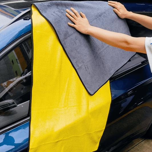 Thick microfiber towel for truck and car wash, super absorbent and extra large for drying and detailing.