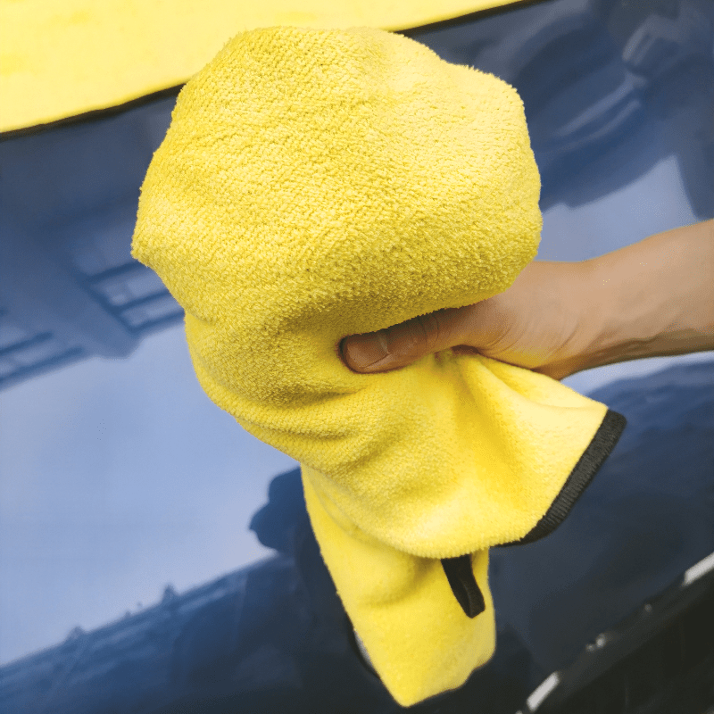 Thick microfiber towel for truck and car wash, super absorbent and extra large for drying and detailing.