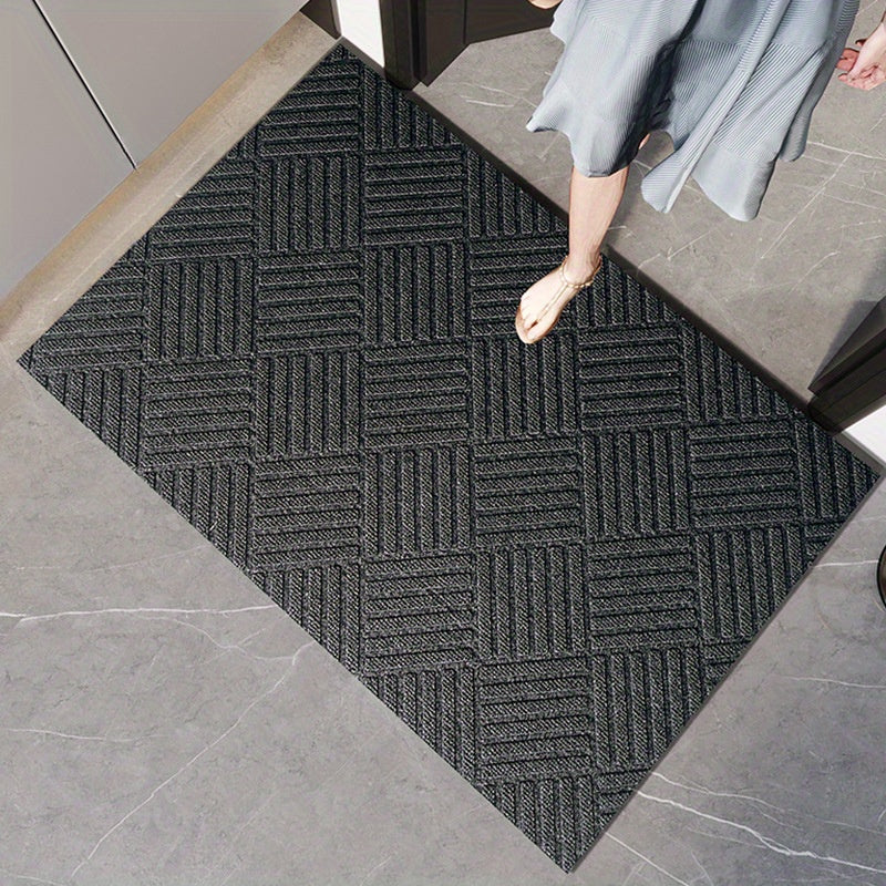 Rubber door mat for household use. Designed to prevent slipping on floors, perfect for entrances and foyers.