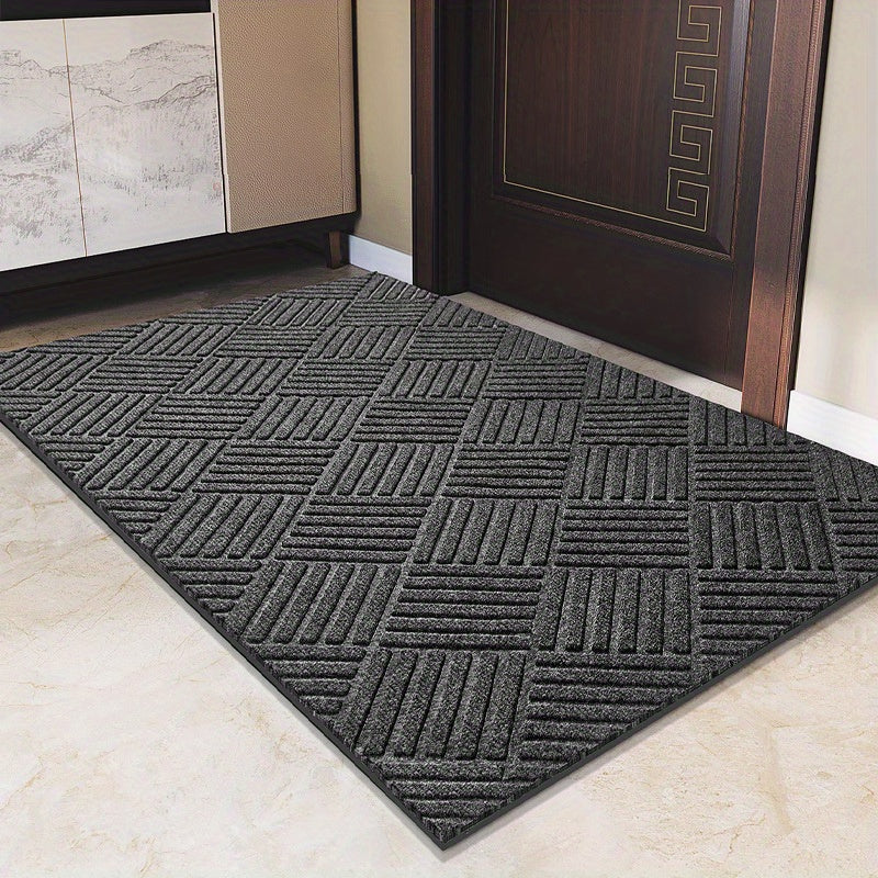 Rubber door mat for household use. Designed to prevent slipping on floors, perfect for entrances and foyers.