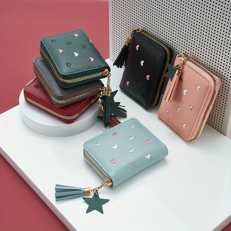 Heart and star embroidered tassel wallet with Korean style, zip-around coin purse. Ideal gift for special occasions. Embroidered clutch in faux leather material.