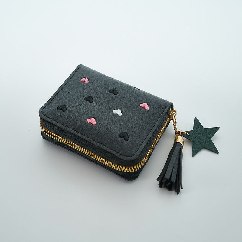 Heart and star embroidered tassel wallet with Korean style, zip-around coin purse. Ideal gift for special occasions. Embroidered clutch in faux leather material.