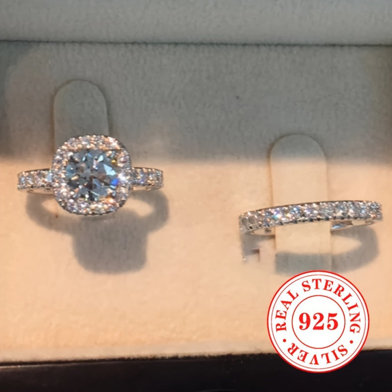 Celebrate your love with our Valentine's Day 2-Piece Engagement Ring Set for Women, crafted from 4.9g of 925 Sterling Silver. Featuring a classic 4-Prong Solitaire design with sparkling Cubic Zirconia stones, this elegant set is perfect for weddings