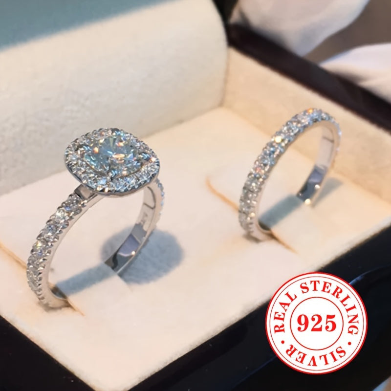 Celebrate your love with our Valentine's Day 2-Piece Engagement Ring Set for Women, crafted from 4.9g of 925 Sterling Silver. Featuring a classic 4-Prong Solitaire design with sparkling Cubic Zirconia stones, this elegant set is perfect for weddings