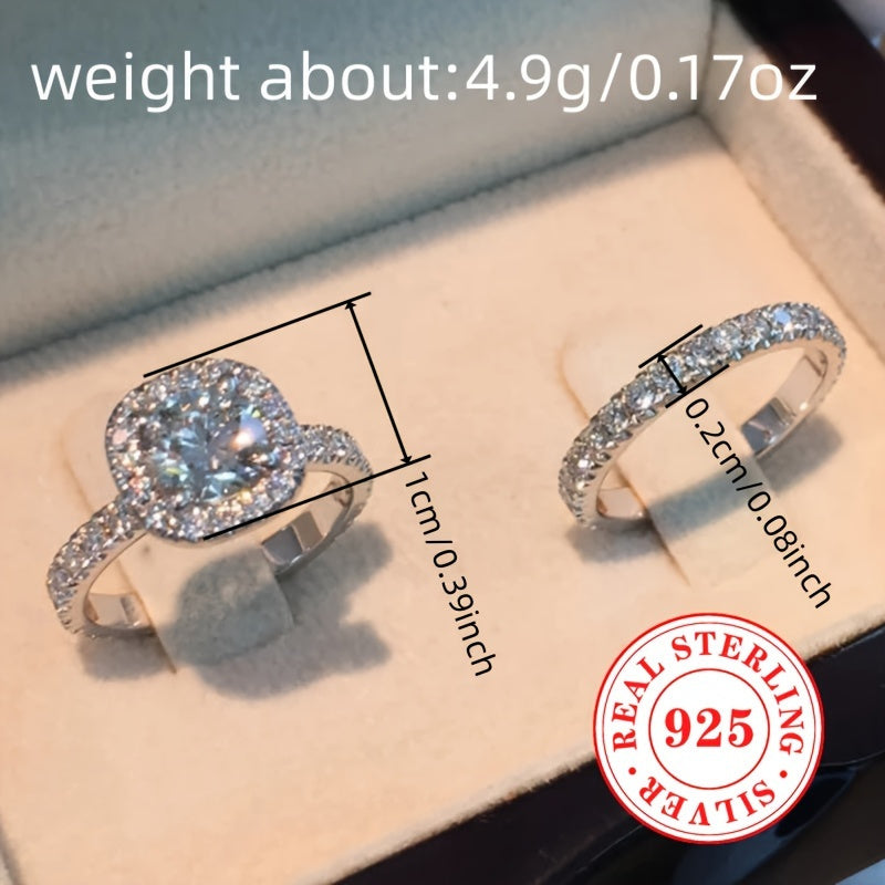 Celebrate your love with our Valentine's Day 2-Piece Engagement Ring Set for Women, crafted from 4.9g of 925 Sterling Silver. Featuring a classic 4-Prong Solitaire design with sparkling Cubic Zirconia stones, this elegant set is perfect for weddings