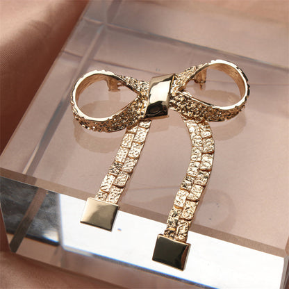 Stylish Rhinestone Bow Brooch - A sophisticated and fashionable accessory that can be worn on clothing, bags, or hats | Ideal for adding a touch of glamour to any outfit, whether for a party or everyday wear, while traveling, or simply to exude personal