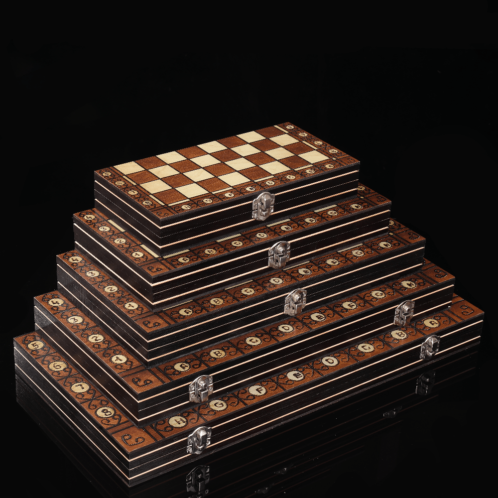 Wooden 3-in-1 board game set with chess, checkers, and backgammon. Foldable, portable, and velvety interior for slip-resistance. Durable wood fiber construction. Suitable for teens and