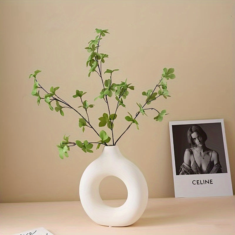 1 chic donut-shaped plastic vase - a classic home decor accent for living rooms.