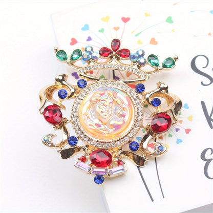 Old-fashioned Sleeping Beauty relief brooch with rhinestones, perfect for ladies wearing classic court dresses.