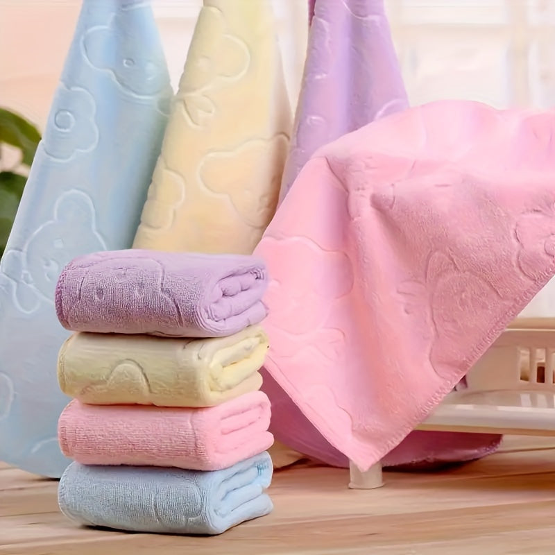 Set of 4 ultra-soft microfiber towels in pastel colors with cartoon dot pattern, perfect for bathroom and kitchen use.