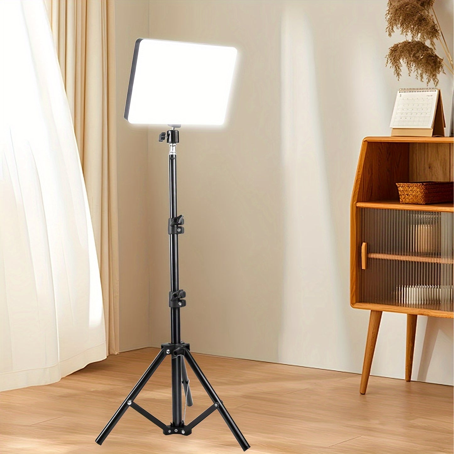 10-inch LED Flat Panel with adjustable 43-inch tripod stand, USB powered, dimmable with 3 color modes and 10 brightness levels for photography, live streaming, and studios.