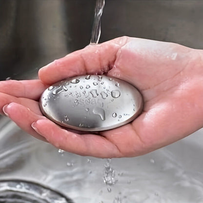 '- Upgrade your kitchen essentials with the 1pc Stainless Steel Oval Deodorizing Soap, specially designed to remove hand odor, garlic, and fish smell. Say goodbye to unwanted odors with this essential kitchen cleaning tool, a must-have for every