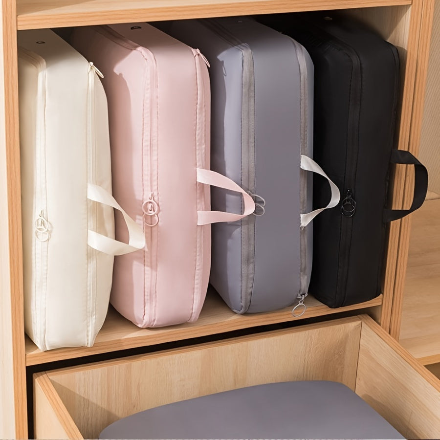 A set of 2 compression packing cubes that expand to save space, perfect for organizing blankets, bedding, and travel accessories. These durable cubes offer portable and heavy-duty storage solutions.