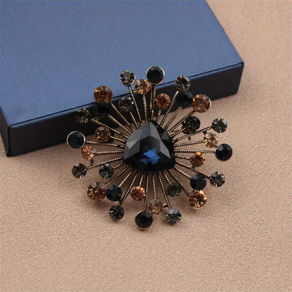 Versatile and beautiful, this elegant and luxurious Rhinestone Flower Brooch features an irregular shape and water-cut design, making it the perfect accessory for women.