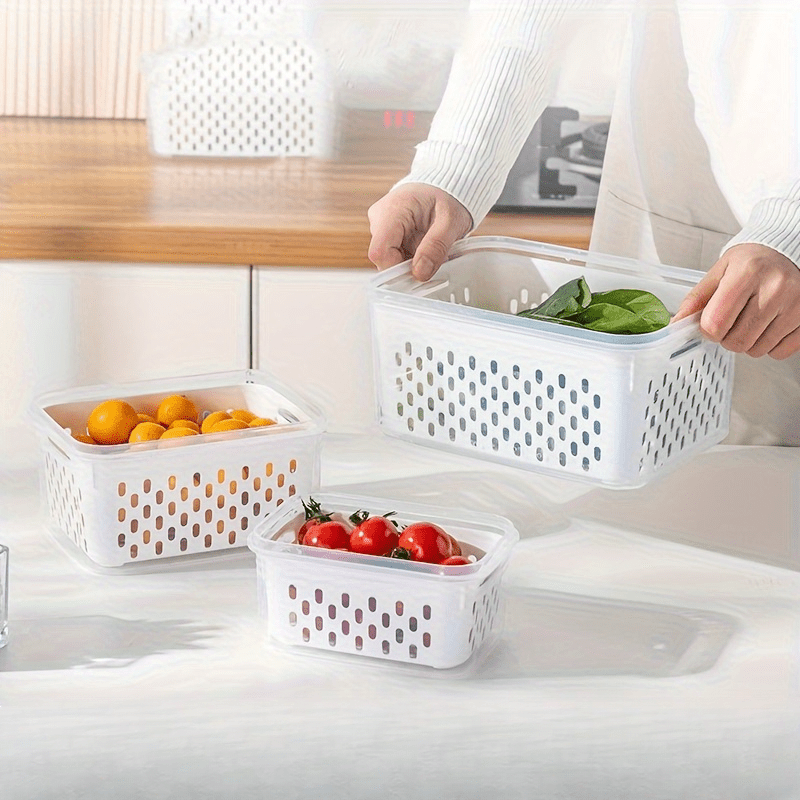 Set of four leak-proof and BPA-free food storage containers with a 2-layer airtight design, perfect for convenient meal prep. These reusable and stackable organizers are great for storing fruits, vegetables, meat, and grains in the kitchen.