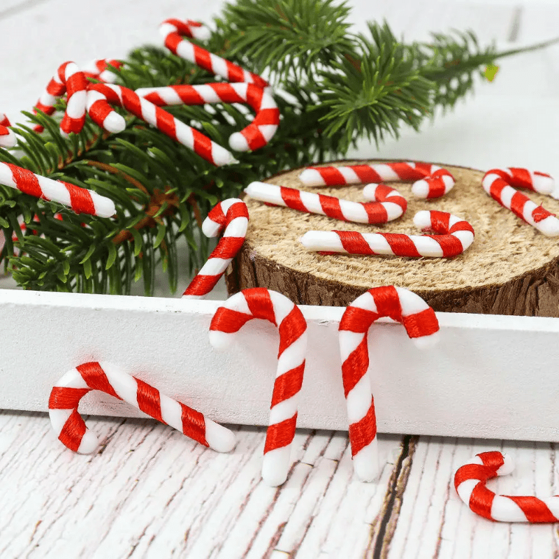 15 mini Christmas candy canes with Santa Claus theme, red and white ornaments for tree and party decor.