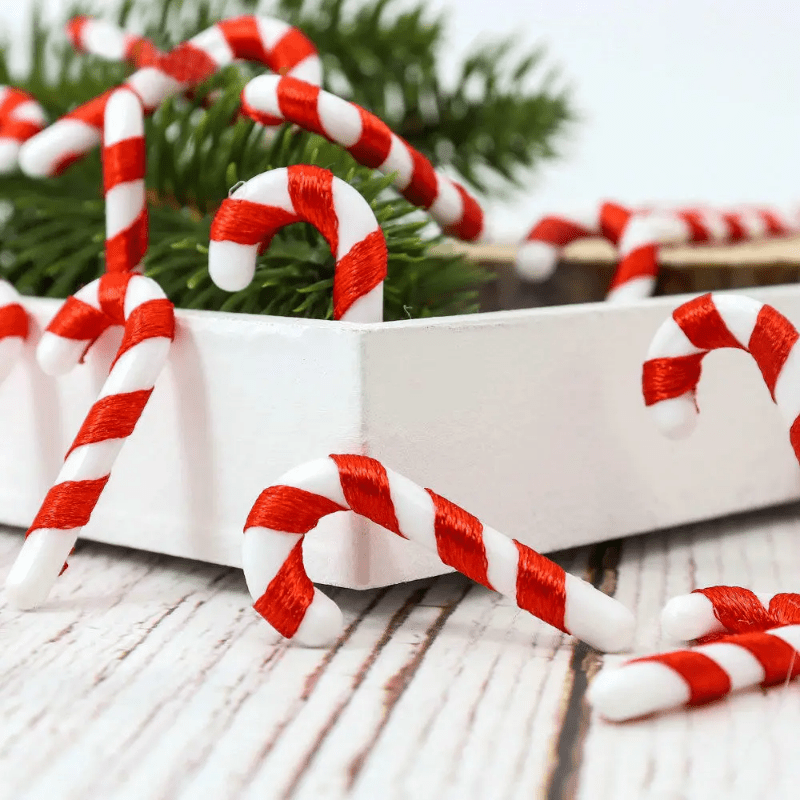 15 mini Christmas candy canes with Santa Claus theme, red and white ornaments for tree and party decor.