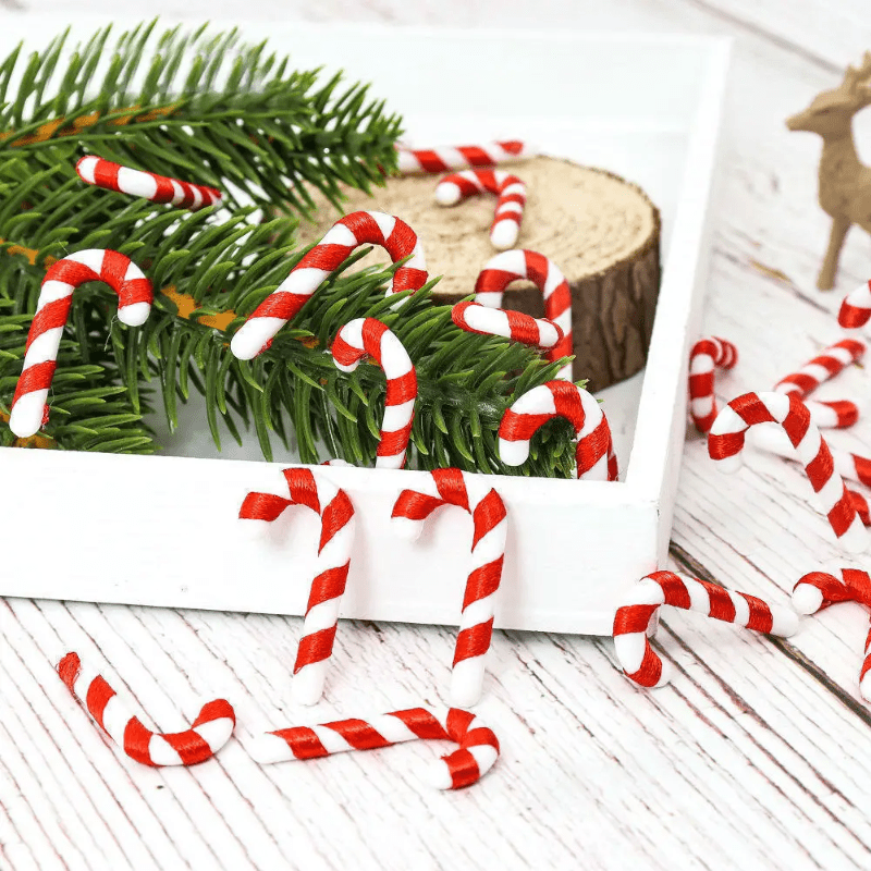 15 mini Christmas candy canes with Santa Claus theme, red and white ornaments for tree and party decor.