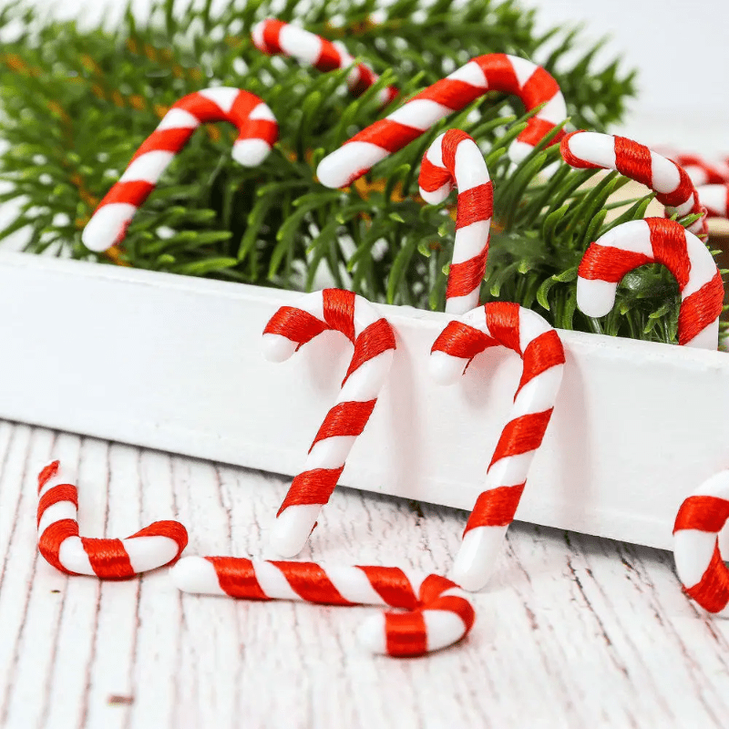 15 mini Christmas candy canes with Santa Claus theme, red and white ornaments for tree and party decor.