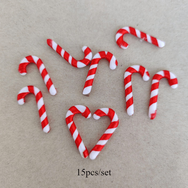 15 mini Christmas candy canes with Santa Claus theme, red and white ornaments for tree and party decor.