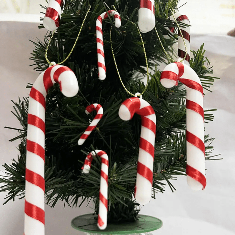 15 mini Christmas candy canes with Santa Claus theme, red and white ornaments for tree and party decor.